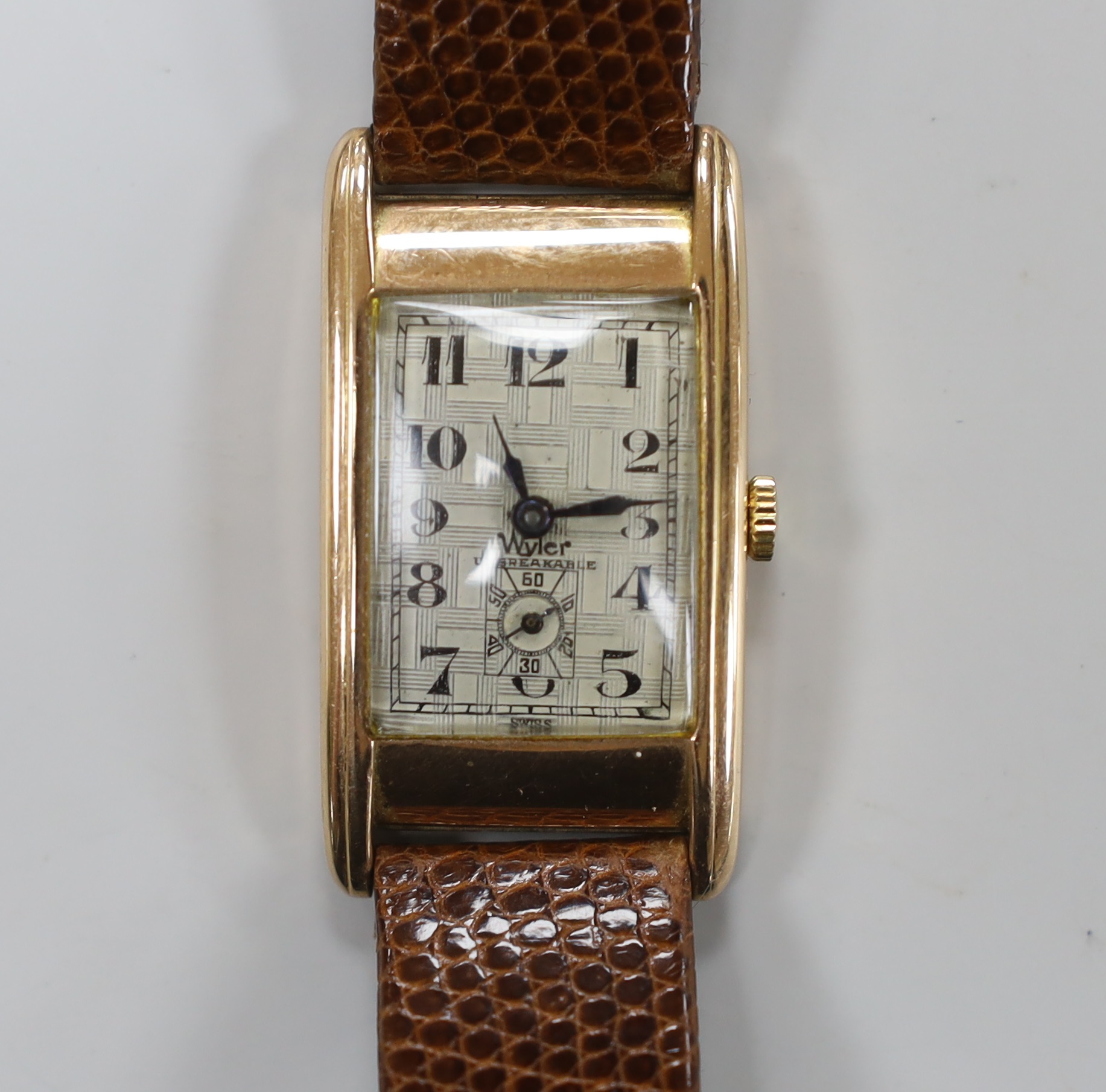 A gentleman's 1930's 9ct gold Wyler rectangular manual wind wrist watch, with Arabic dial and subsidiary seconds, on later lizard strap.